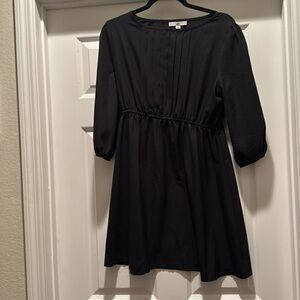 ya black casual dress size L. No belt, but you could add one. Stretch at waist